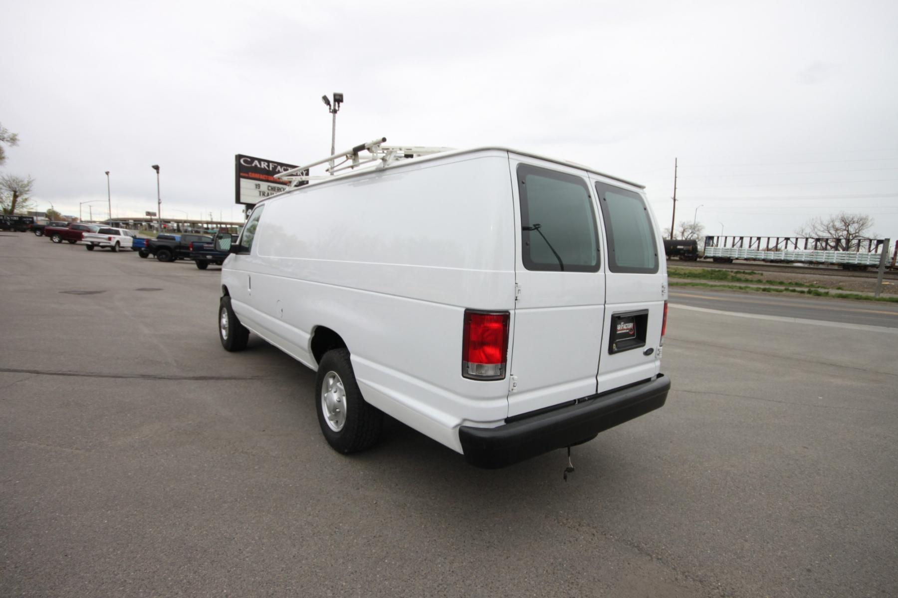 2014 White /Grey Ford E-Series Van (1FTSS3EL3ED) with an 5.4L V8 engine, Automatic transmission, located at 4562 State Avenue, Billings, MT, 59101, (406) 896-9833, 45.769516, -108.526772 - Photo #2